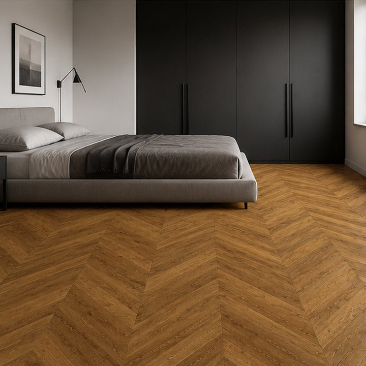 Schlafzimmer mit modernem Bett und Chevron Parkett Neuschwanstein in Herringbone